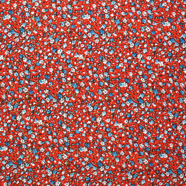 Crépon viscose lurex mini fleurs bleu fond rouge
