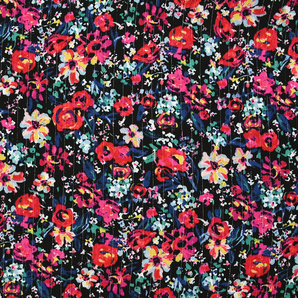 Crépon viscose lurex fleurs en folie fond noir
