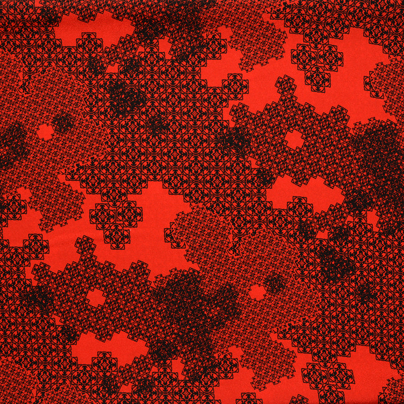 Crêpe georgette satiné fin motif de masse noir et rouge