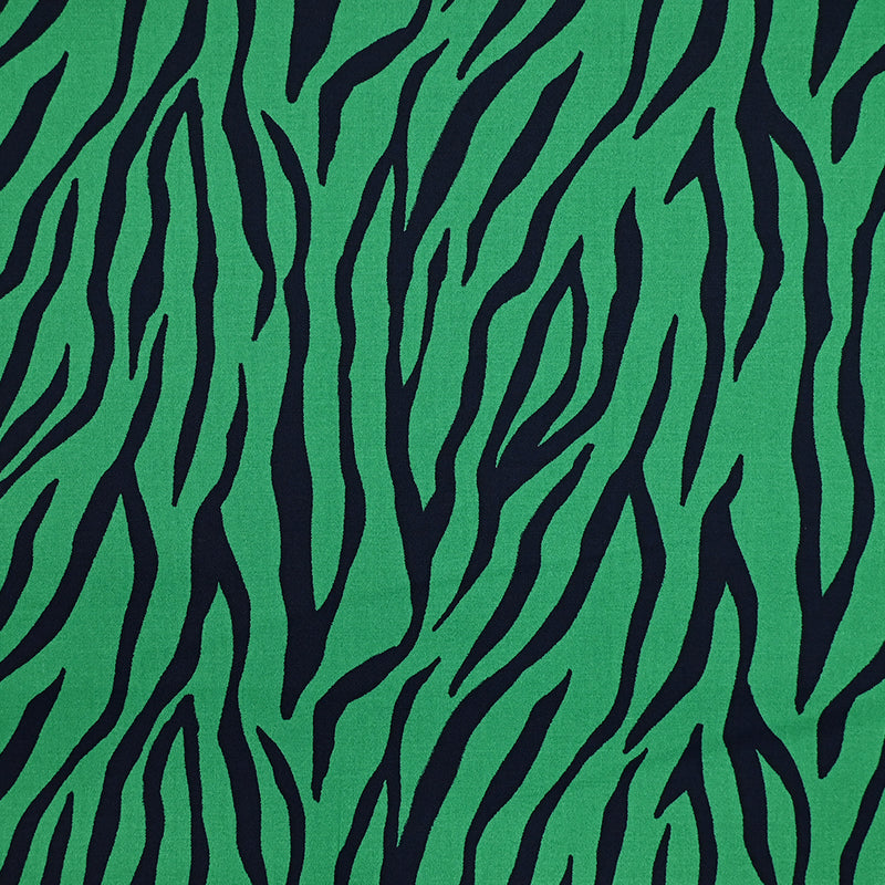 Satin de coton élasthanne imprimé tigres fond vert