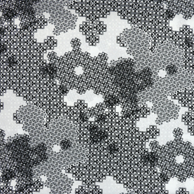 Crêpe georgette satiné fin motif de masse noir et blanc