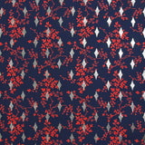 Microfibre imprimée polyester fleurs rouges et losanges argent fond marine