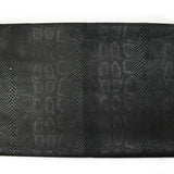 Velours polyester effet serpent fond noir