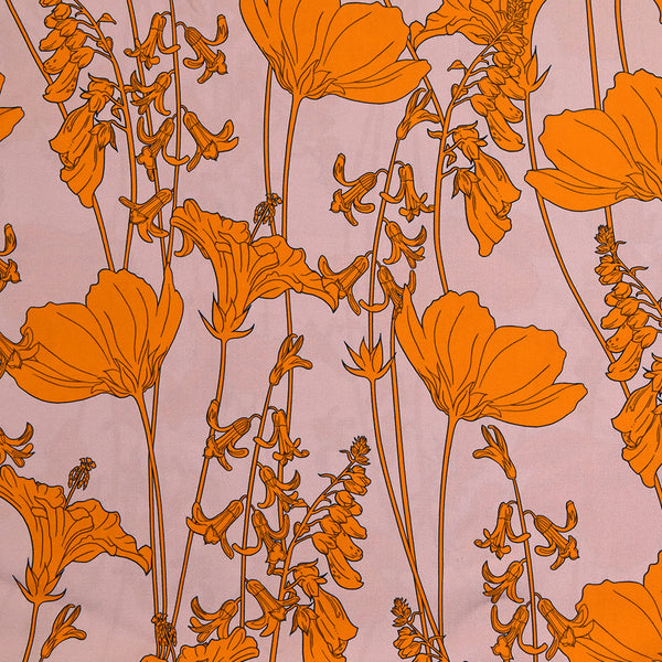 Viscose imprimée fleurs en lianes orange fond vieux rose