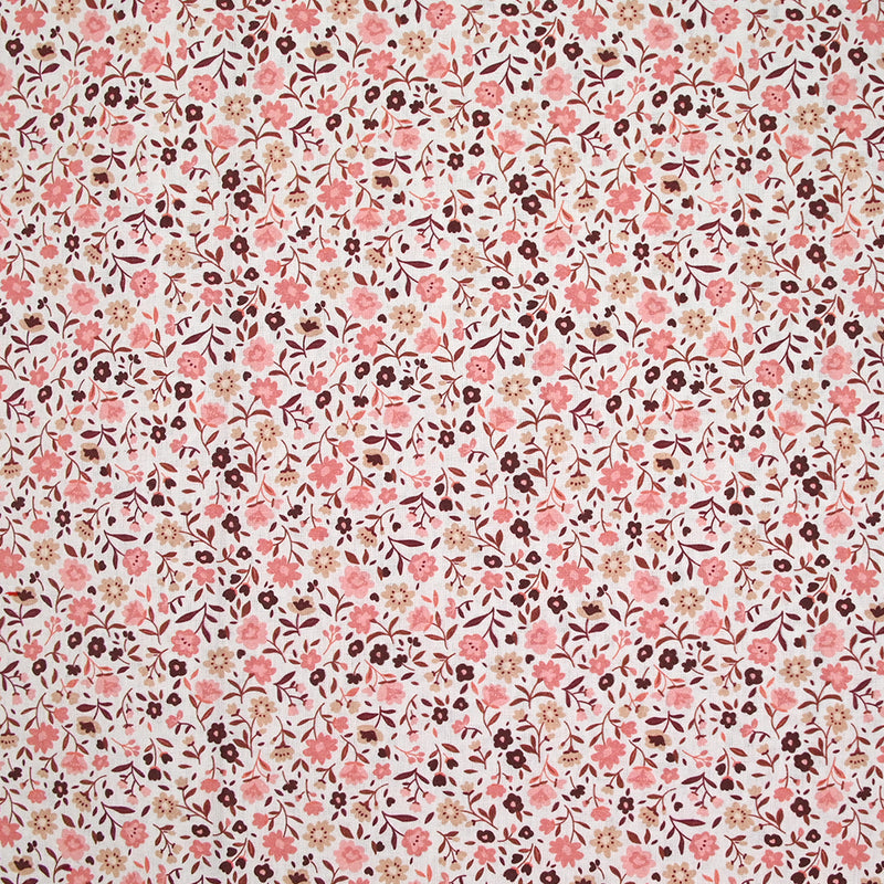 Coton imprimé ouragan floral rose fond blanc
