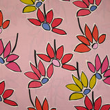 Coton satiné imprimé fleurs naïves orange fond rose