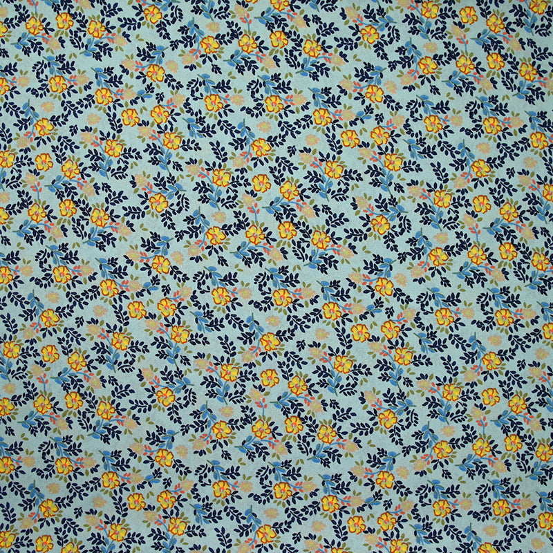 Crêpe de polyester imprimé micro pousses marine fond bleu