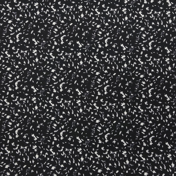 Crêpe polyester imprimé graphique taches blanches fond noir