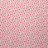 Crêpe viscose imprimé mini fleurs rouges sur fond blanc
