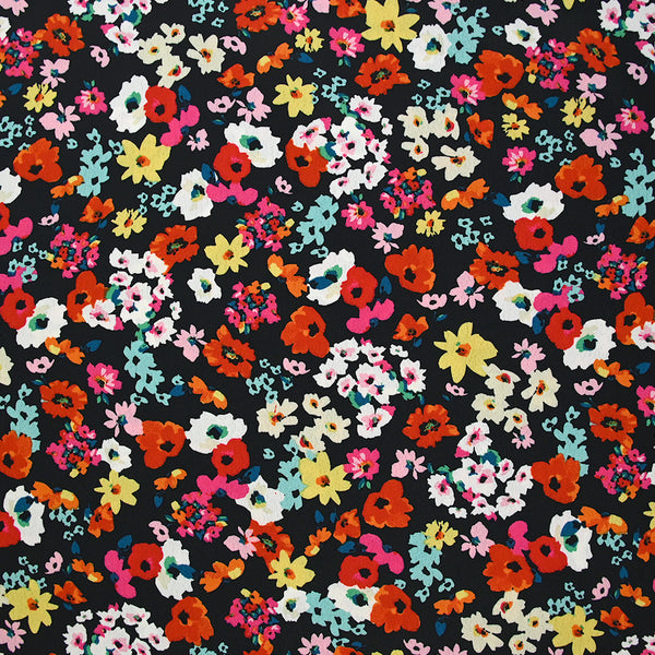 Crépon polyester fleuri multicolore fond noir