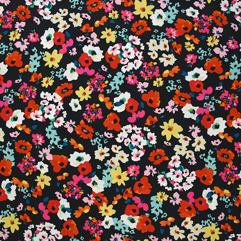 Crépon polyester fleuri multicolore fond noir