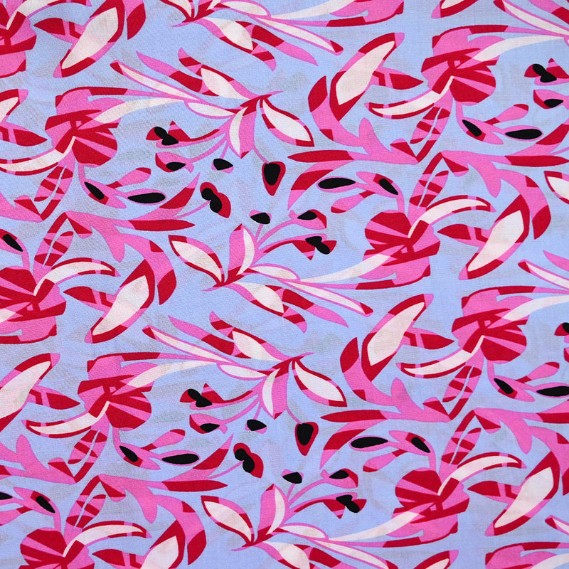 Viscose imprimée fleurs champi rose fond bleu