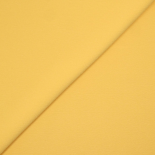 Crêpe de polyester texturé jaune beurre