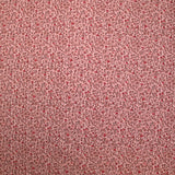 Toile de coton imprimée fleurs en miniature fond rose