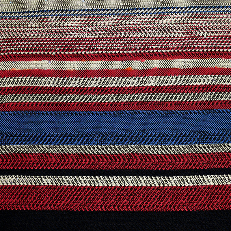 Tweed fantaisie en coton rouge et bleu