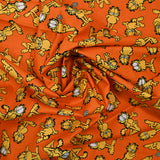 Popeline de coton imprimé Garfield fond orange