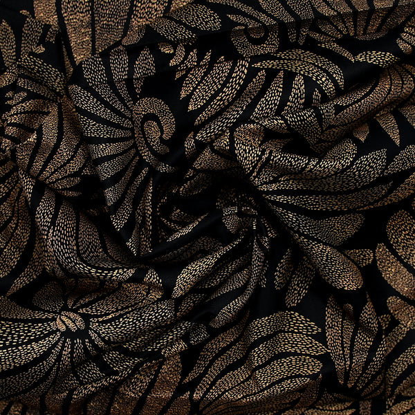 Popeline de coton imprimée pétales en pointillisme marron fond noir