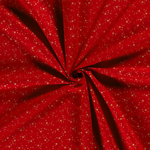 Coton de Noël imprimé tourbillon d'étoiles doré fond rouge