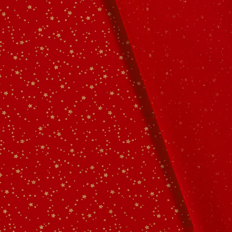 Coton de Noël imprimé tourbillon d'étoiles doré fond rouge