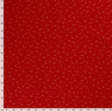 Coton de Noël imprimé tourbillon d'étoiles doré fond rouge