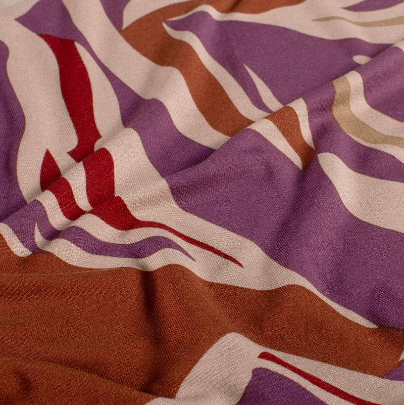 Jersey de viscose imprimé flamme fond violet
