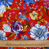 Crépon polyester jolie pivoine bleu fond rouge