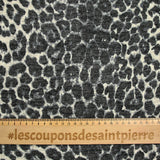 Maille polyester imprimée guépard gris fond écru
