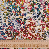 Polyester imprimé léopard multicolore fond beige
