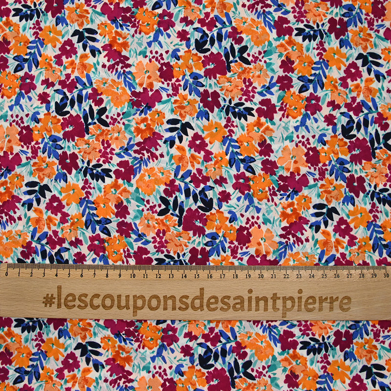 Crêpe de polyester imprimé picore nature orange fond blanc