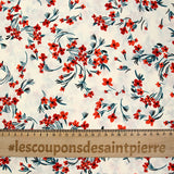 Polyester imprimé floral rouge et bleu sur fond ivoire
