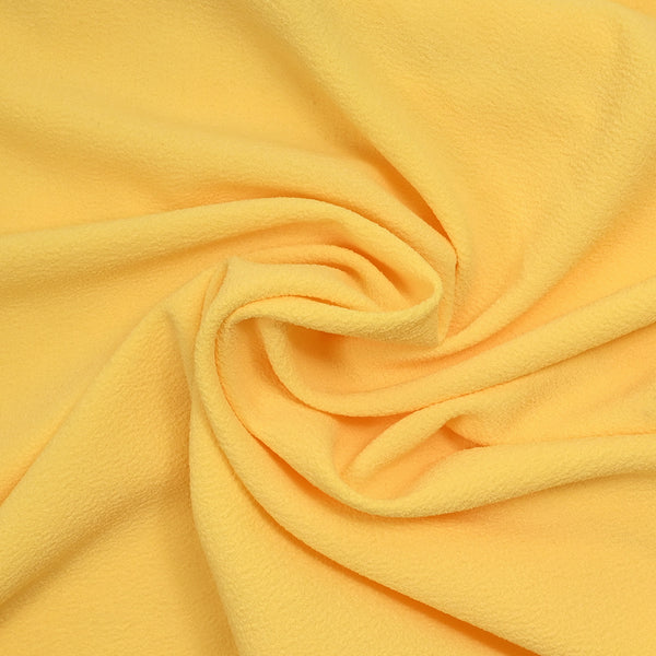Crêpe de polyester texturé jaune beurre