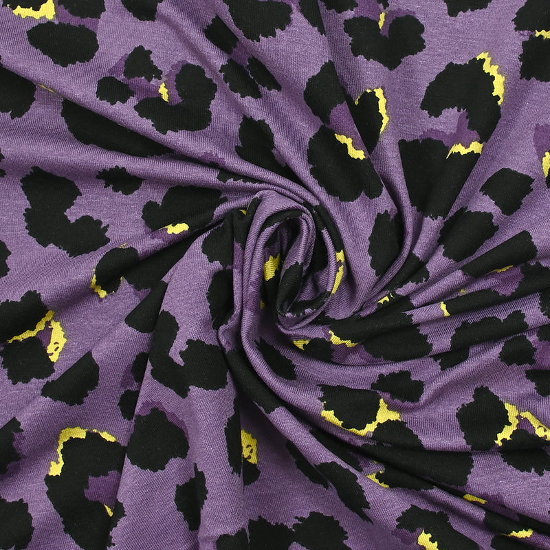 Jersey de viscose imprimé panthère noir fond violet