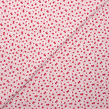 Crêpe viscose imprimé mini fleurs rouges sur fond blanc