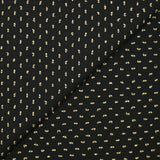 Voile de polyester plumetis beige fond noir