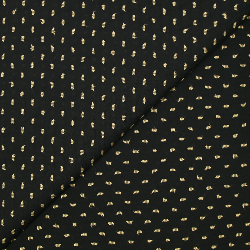 Voile de polyester plumetis beige fond noir