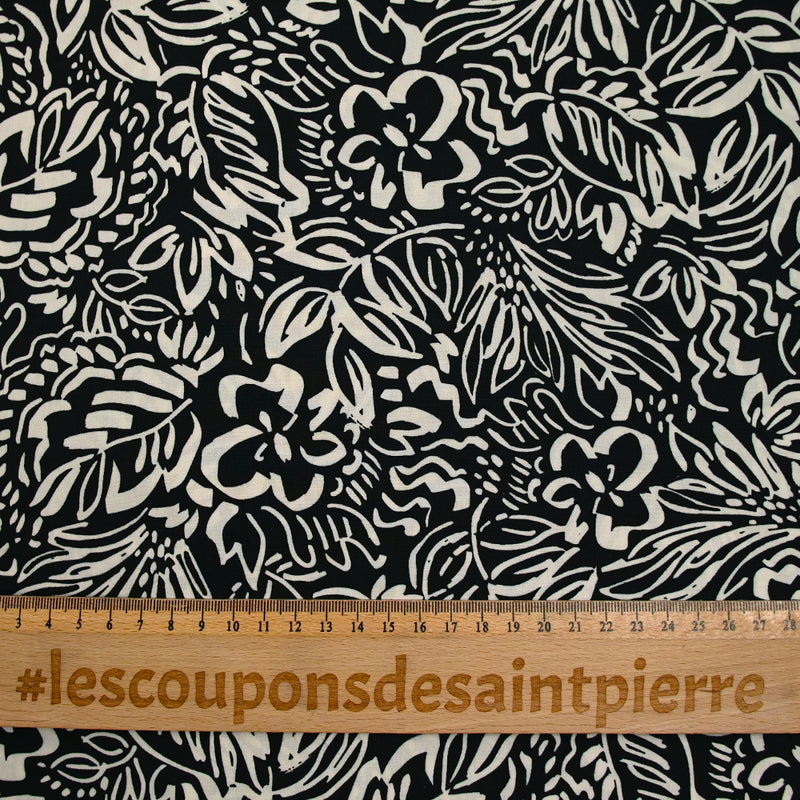 Coton imprimé croquis fleurs blanc fond noir