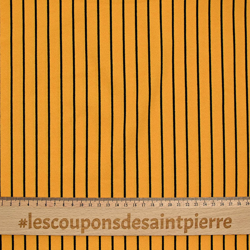 Textured polyester jersey thin black stripes mustard background