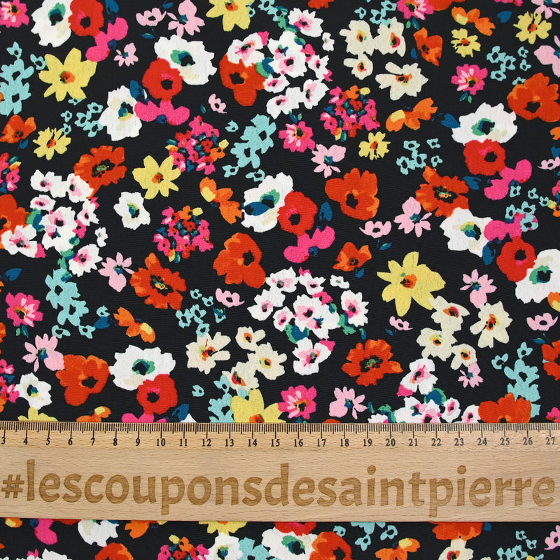 Crépon polyester fleuri multicolore fond noir
