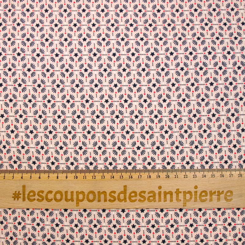 Crépon imprimé étoile marine fond rose chair