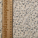 Voile de coton imprimé et floqué fleurettes fond beige clair