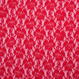 Dentelle polyester Rosie lurex doré fond rouge