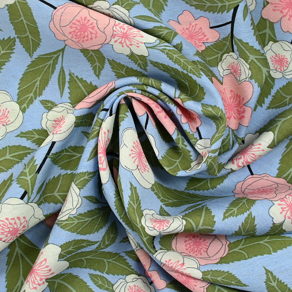 Viscose imprimée légère fleurs de cerisier fond bleu ciel