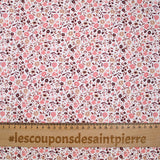 Coton imprimé ouragan floral rose fond blanc