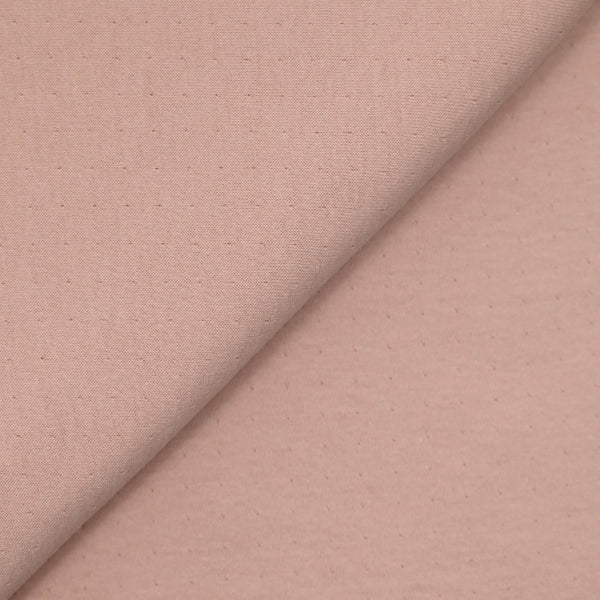 Jersey de coton contrecollé point percé rose pâle