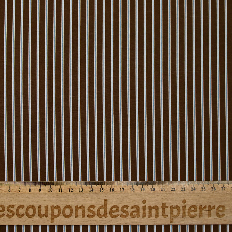 Coton imprimé rayé bleu fond marron