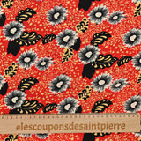 Viscose imprimée fleurs noir et blanc fond rouge