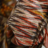 Maille ajourée tricotée motif losange de feu beige et marron