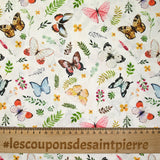 Coton imprimé papillons multicolore fond blanc