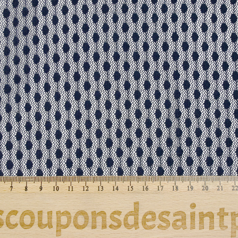 Maille ajourée fine à pois bleu marine