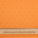 Crêpe satin de polyester Lola fond orange